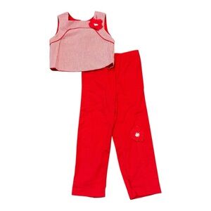 Reina Mora red and white pants outfit